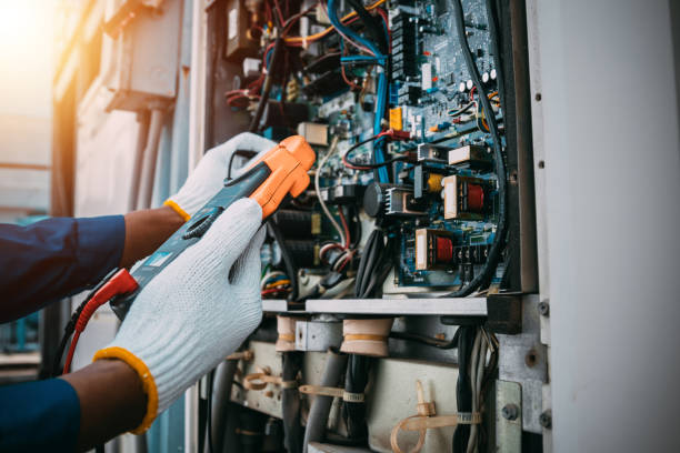 Electrician working on a consumer unit
